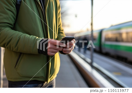AI-generated content. Focus Hand of human using mobile phone at railway station, AI Generative 110113977