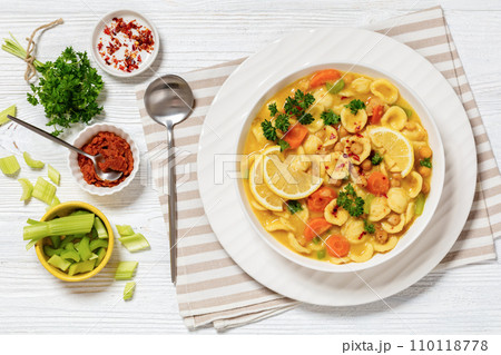 orecchiette pasta chickpea soup in white bowl orecchiette pasta chickpea soup in white bowl 110118778
