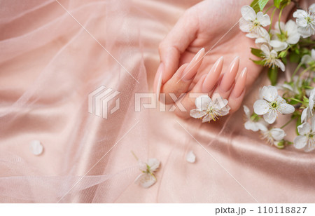 Elegant pastel pink natural manicure. 110118827