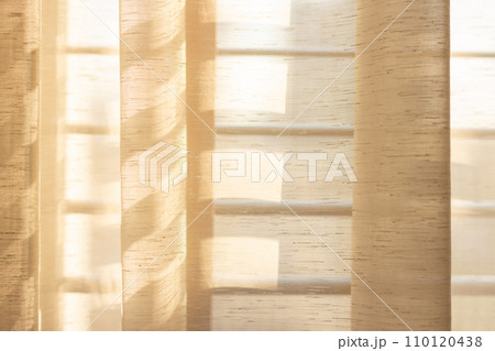 Close up texture of curtain and light of sun 110120438