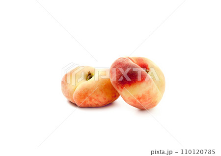 Two saturn peaches or flat peaches isolated on white background with clipping path.. 110120785