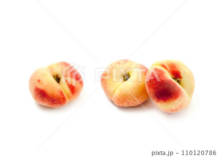 Three saturn peaches or flat peaches isolated on white background with clipping path.. Three saturn peaches or flat peaches isolated on white background with clipping path.. 110120786