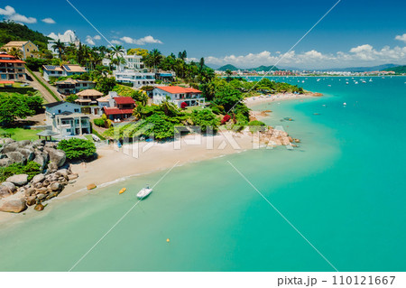 Holiday beach with resort town and turquoise ocean in Brazil. Aerial view 110121667