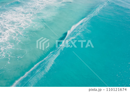 Clear ocean and surfing wave. Surfing dream in tropics. Aerial view 110121674