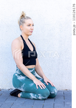 Sporty Millennial Woman in Fitness Attire Sporty Millennial Woman in Fitness Attire 110126176