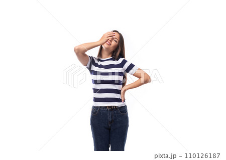 smiling slim young brunette woman with straight hair dressed in a striped t-shirt smiling slim young brunette woman with straight hair dressed in a striped t-shirt 110126187