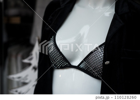 Closeup of black bra on mannequin in a fashion store showroom 110128260