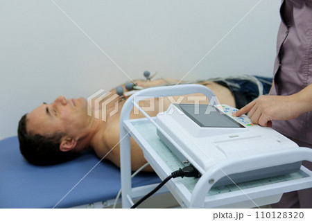 Young patient is being examined in the cardiology department 110128320