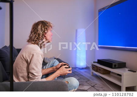 Gamer boy in his room Gamer boy in his room 110128702