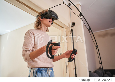 Young active guy in his room 110128721