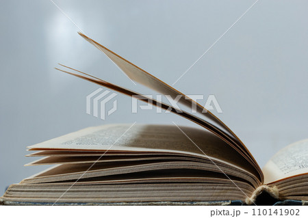 open book on pile of books background shcool study book. The concept of reading literature, education and book publishing. Free space for text 110141902