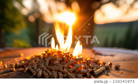 Fiery Biomass: Wood Pellets Igniting in a Pile 110141973