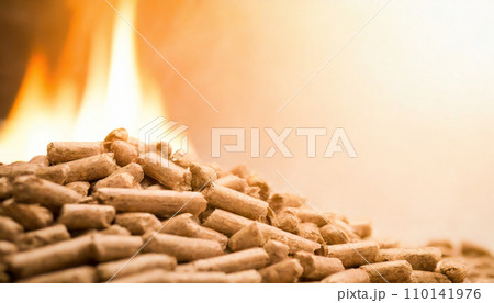 Fiery Biomass: Wood Pellets Igniting in a Pile Fiery Biomass: Wood Pellets Igniting in a Pile 110141976