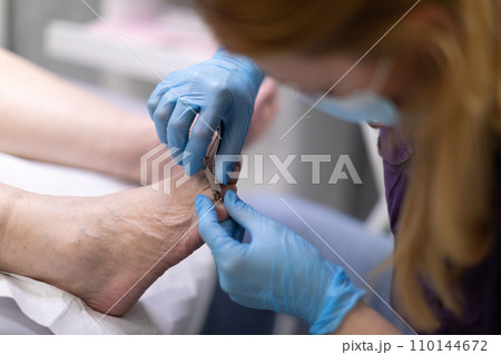 Podiatry salon offering comprehensive foot care services. Podiatry salon offering comprehensive foot care services. 110144672