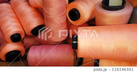 Group of colorful yarn on spool, yarn on tube, cotton, wool, linen thread Group of colorful yarn on spool, yarn on tube, cotton, wool, linen thread 110146301