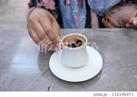 women drinking turkish coffee at cafe women drinking turkish coffee at cafe 110146971