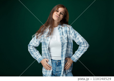 Portrait of an attractive young lady with gorgeous long brown hair Portrait of an attractive young lady with gorgeous long brown hair 110148529