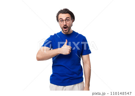 young brutal caucasian brunette man with stylish haircut and beard in blue t-shirt with identity young brutal caucasian brunette man with stylish haircut and beard in blue t-shirt with identity 110148547