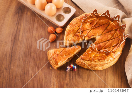 Galette des rois on wooden table.Traditional Epiphany cake in France 110148647