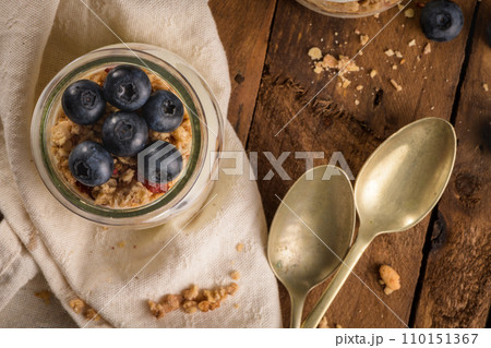 Yogurt parfait with blueberry and granola Yogurt parfait with blueberry and granola 110151367