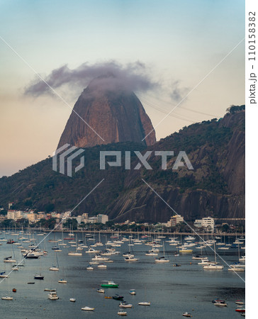 Misty Sugarloaf Mountain Overlooking Tranquil Bay Area Misty Sugarloaf Mountain Overlooking Tranquil Bay Area 110158382