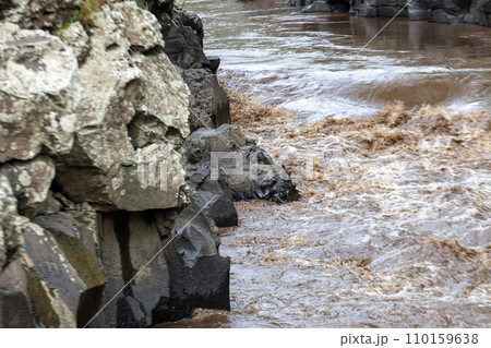 Rocks and water in the river in the rainy season. Nature background 110159638
