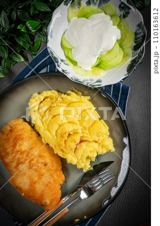 Breaded chicken breast fillet. 110163612