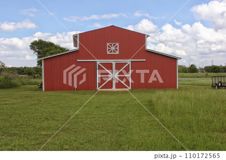 Classic Red Barn on Green Grass With Blue Sky. Rural East Texas 110172565
