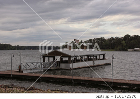 Public Fishing Pier on Lake Tyler in Rural East Texas on Cloudy Day 110172570
