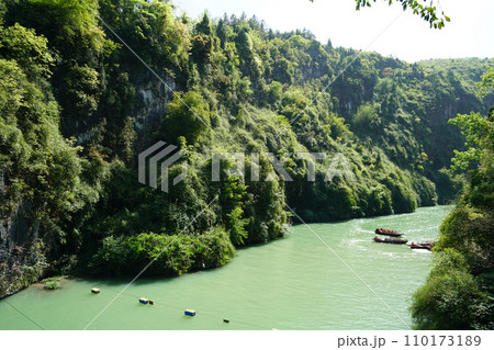 Geological wonders, lush greenery, and underground river rafting adventures. 110173189