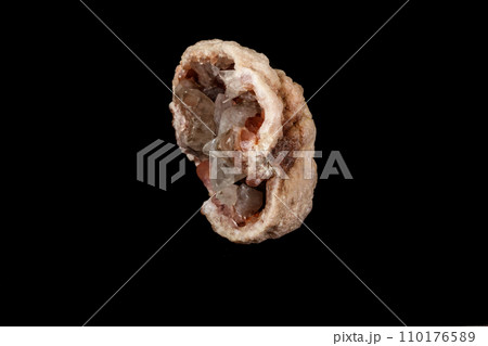 Macro mineral stone Pink Amethyst on a black background 110176589