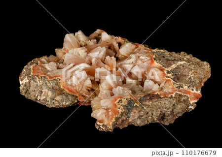 Macro of a stone Stilbite mineral on a black background Macro of a stone Stilbite mineral on a black background 110176679