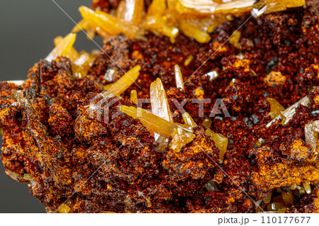 macro mineral Wulfenite stone on a black background macro mineral Wulfenite stone on a black background 110177677