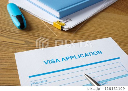 Empty visa application form and pen. Empty visa application form and pen. 110181109