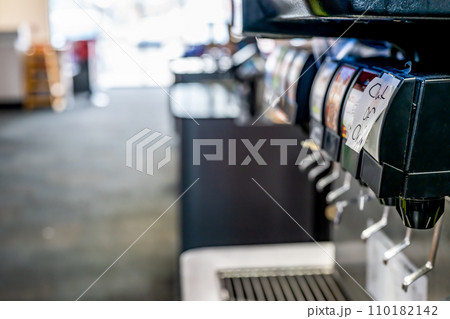 Out of Order sign posted on a soda pop fountain dispenser Out of Order sign posted on a soda pop fountain dispenser 110182142