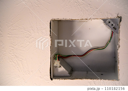 Open cover of bathroom vent with fan removed showing enclosure. Open cover of bathroom vent with fan removed showing enclosure. 110182156