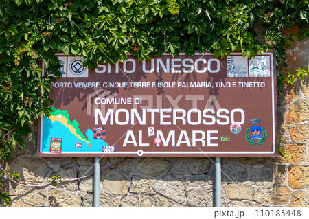 Italy, Monterosso, Municipal sign announcing Unesco, World Heritage 110183448
