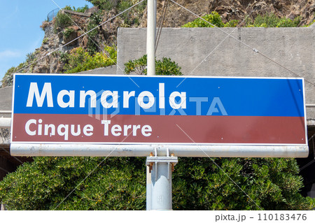 Italy, Manarola, Station platform with station name sign Italy, Manarola, Station platform with station name sign 110183476