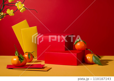 Geometric shaped podiums arranged with some tangerines and envelopes. Podium in asian new year or spring entry realistic greeting poster 110187143