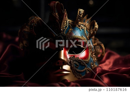 A red blue gold with gold detail full face carnival mask festival beautiful with dark studio shot for concept and commercial used. A red blue gold with gold detail full face carnival mask festival beautiful with dark studio shot for concept and commercial used. 110187616