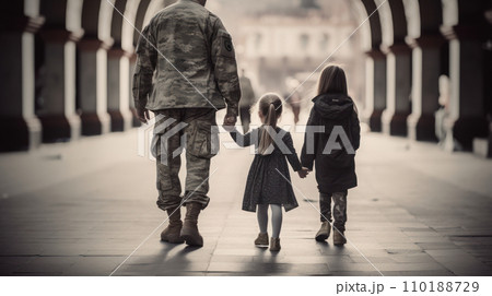 Soldier walk hand in hand with their children Soldier walk hand in hand with their children 110188729
