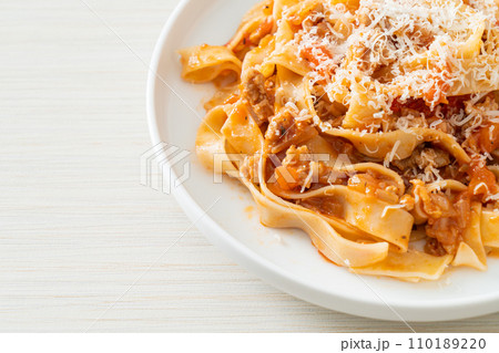Homemade pasta fettuccine bolognese with cheese Homemade pasta fettuccine bolognese with cheese 110189220