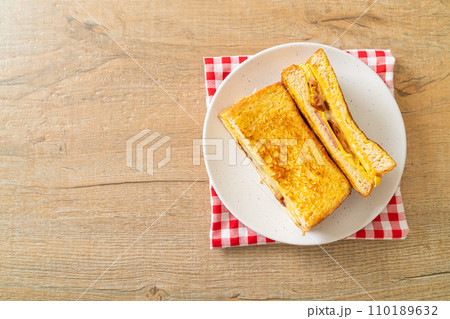 French toast ham bacon cheese sandwich 110189632