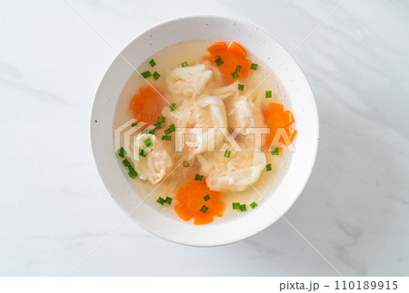 shrimp dumpling soup in white bowl shrimp dumpling soup in white bowl 110189915
