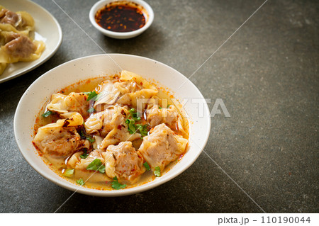 pork wonton soup or pork dumplings soup with roasted chili pork wonton soup or pork dumplings soup with roasted chili 110190044