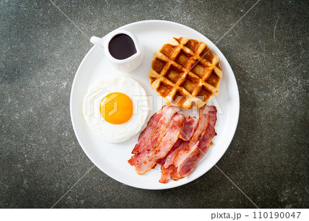 fried egg with bacon and waffle fried egg with bacon and waffle 110190047