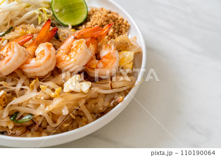stir-fried noodles with shrimp and sprouts or Pad Thai stir-fried noodles with shrimp and sprouts or Pad Thai 110190064