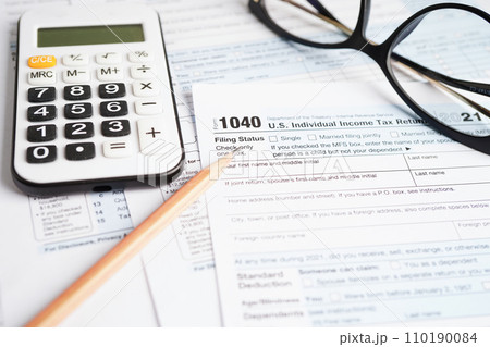 Tax form 1040 U.S. Individual Income Tax Return, business finance concept. 110190084