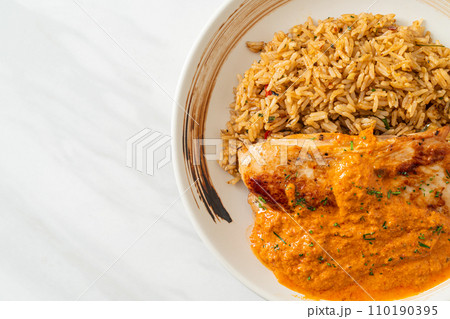 grilled chicken steak with red curry sauce and rice 110190395