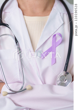 Doctor with purple ribbon for world cancer day, lupus, Pancreatic, Esophageal, Testicular cancer, world Alzheimer, epilepsy, Sarcoidosis, Fibromyalgia and domestic violence Awareness month concepts 110190528
